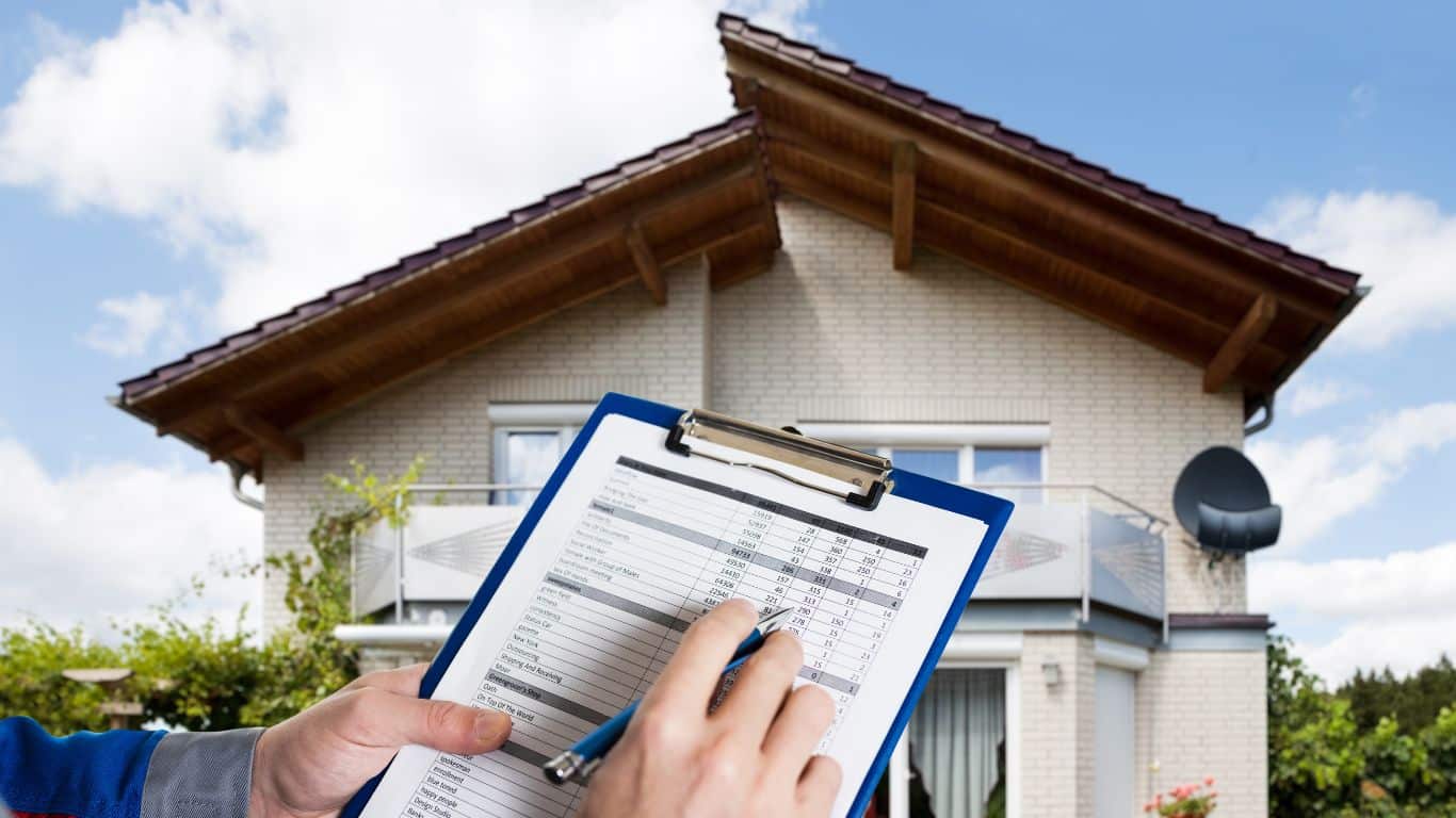 Inspector conducting a Roof Inspection, reviewing a checklist in front of a house to identify potential issues. Essential for maintaining roof safety and quality.