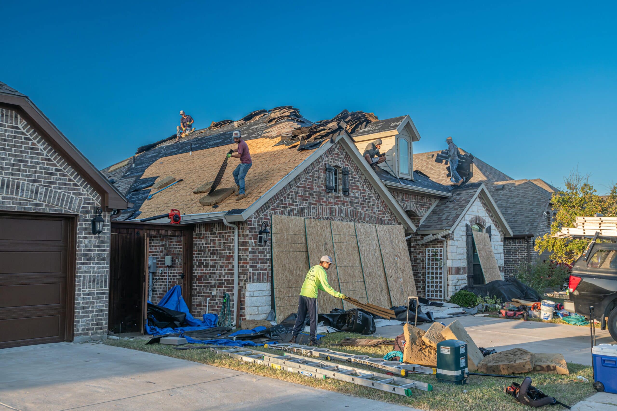 Skybird Roofing team completing a new roof installation in Pasco County