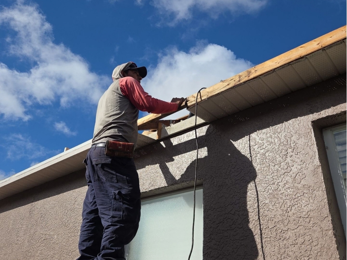 Skybird Roofing crew member working on a residential roof in Odessa, Florida
